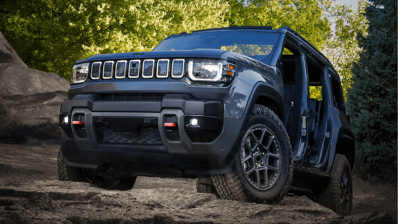 2026 Jeep Recon SUV parked outdoors, front three-quarter view.