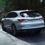 2026 Acura MDX cornering in the rain