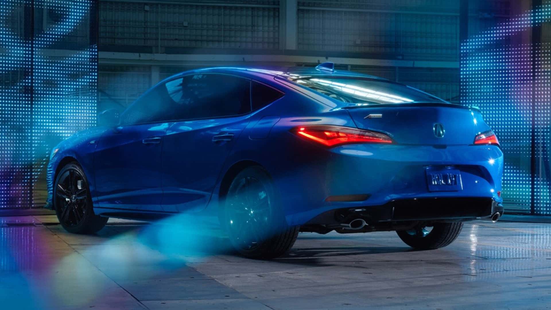 Back View of Blue 2026 Acura Integra in Garage
