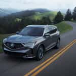 2026-Acura-MDX-driving-cloudy
