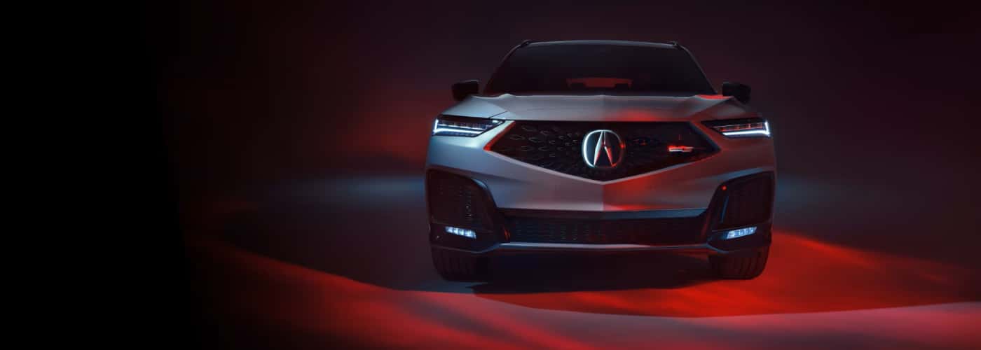 Silver Acura MDX Type S front view in studio lighting