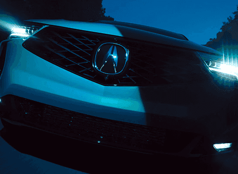 2026 Acura RDX Diamond Pentagon grille and Jewel Eye LED headlights closeup