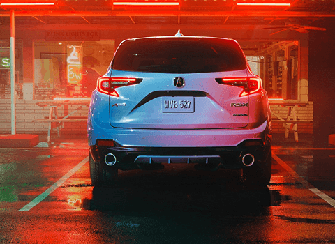 2026 Acura RDX rear view with Dragon Tail LED taillights in Platinum White Pearl