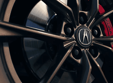 2026 Acura Integra Type S wheel and red Brembo brake caliper closeup
