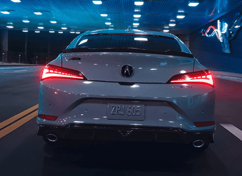2026 Acura Integra rear view in tunnel showing full LED taillights