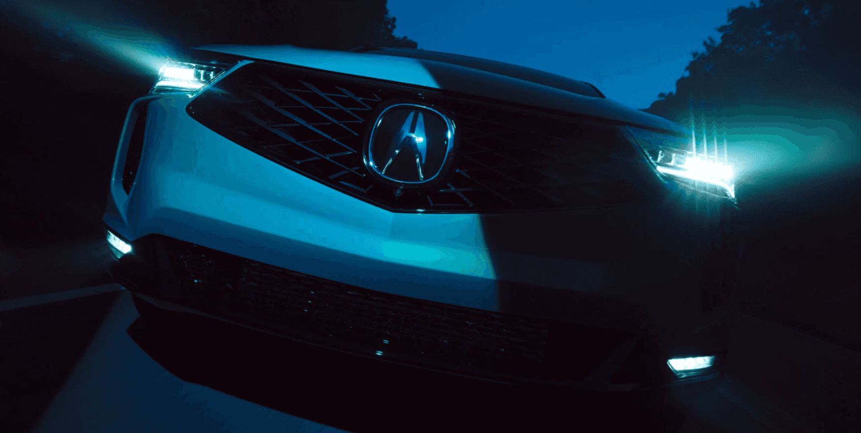 Front façade of a white 2026 Acura RDX