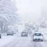 Many Cars Driving In Snow