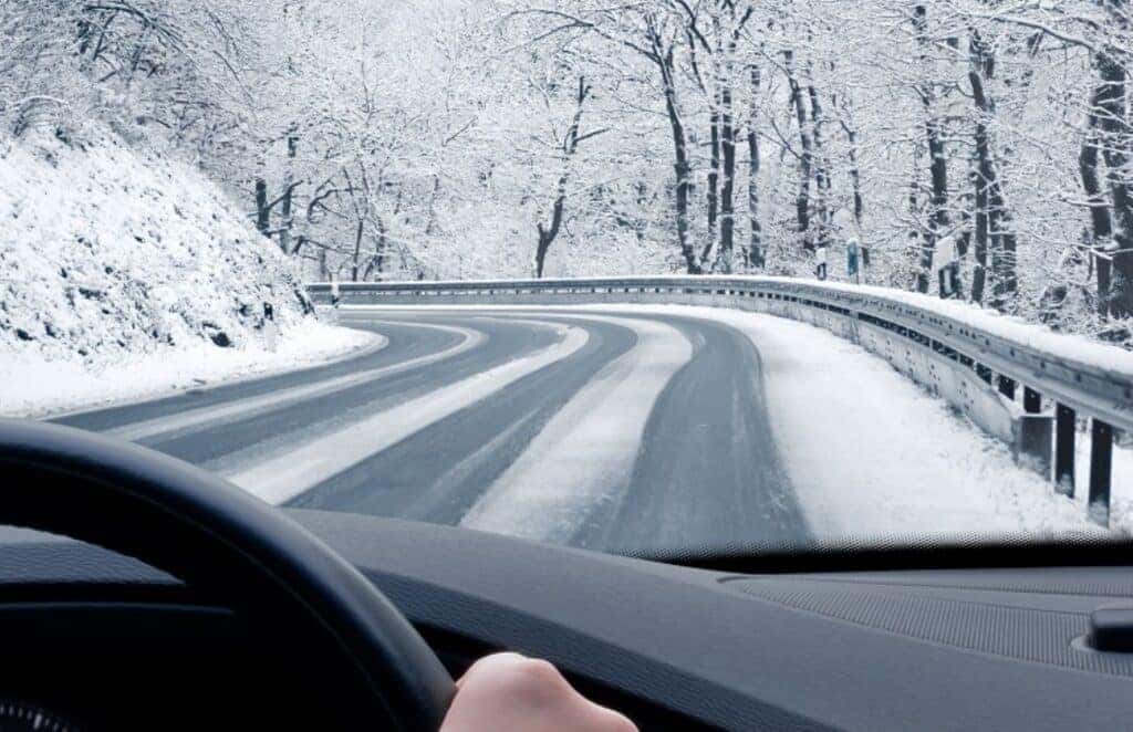 A Responsible Driver Driving On A Winter Day With Winter Tires