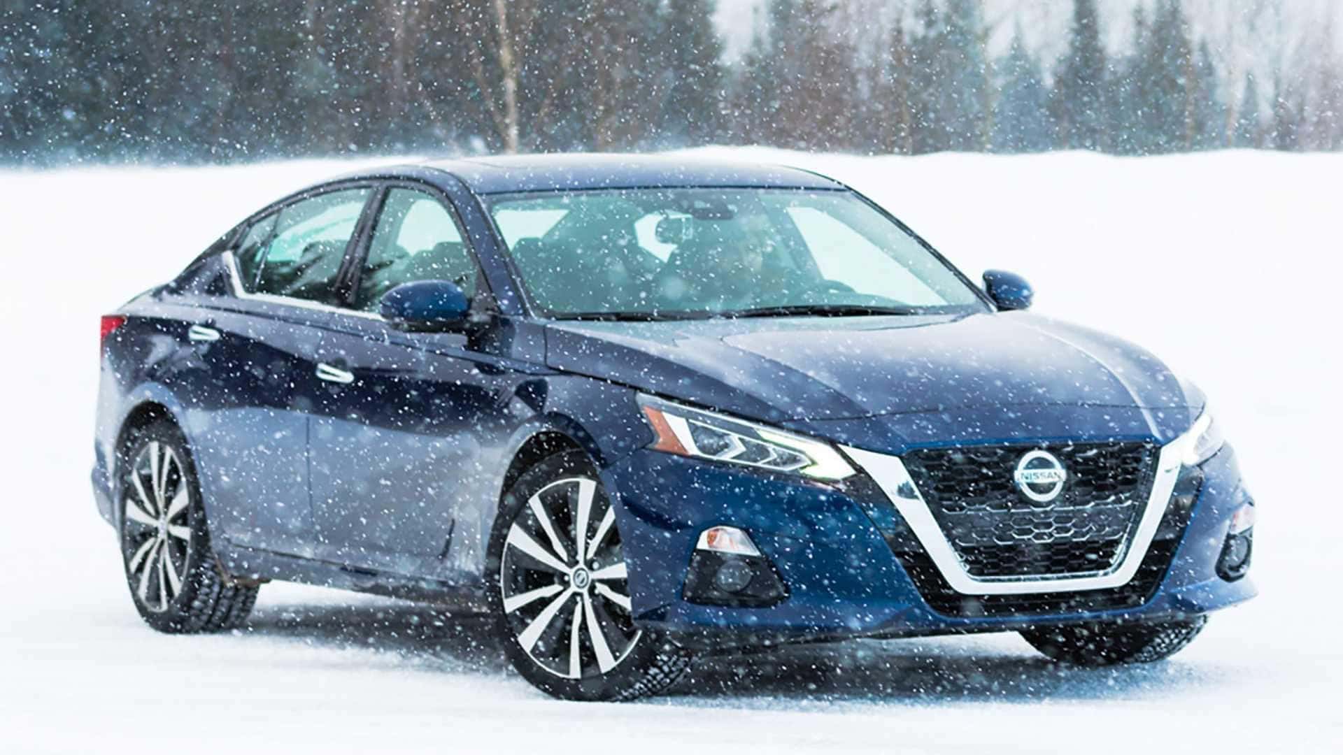 2019 Nissan Altima Deep Blue Pearl in snow