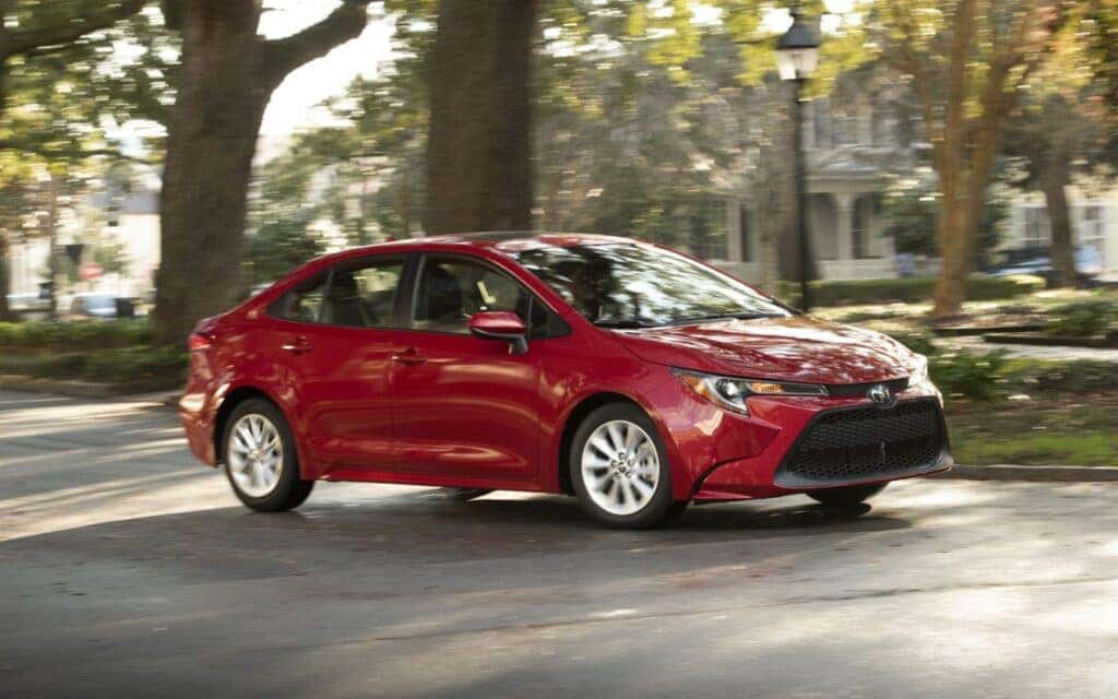 Used Toyota Corolla in Barcelona Red Metallic In Motion