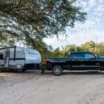 A Towing Expert Using Their Strong Truck To Tow A Trailer