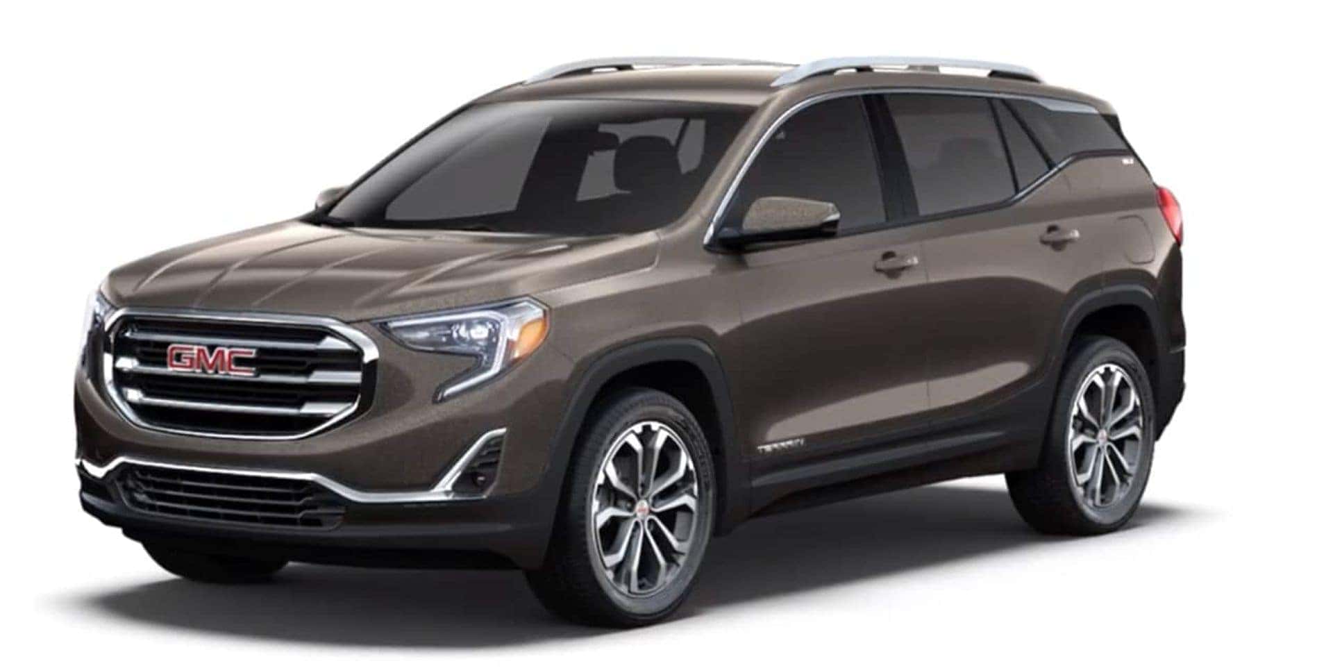 The 2020 GMC Terrain, Colored OF Smokey Quartz Metallic, Parked In Infinite Whiteness