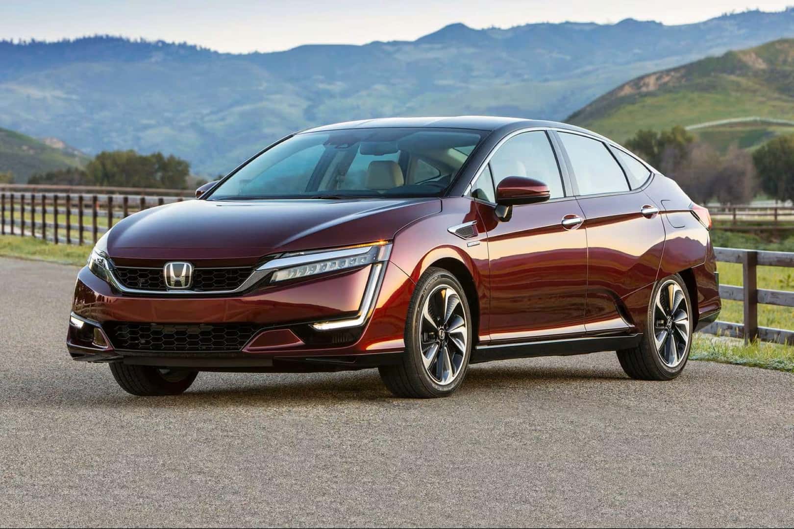 The Burgundy 2020 Honda Sedan Parked Near A Farmland