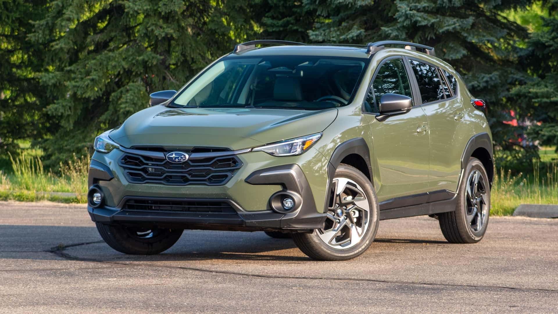 The IIHS Top Safety Pick+: The Handsome 2024 Subaru Crosstrek, Parked In Front Of Green Trees
