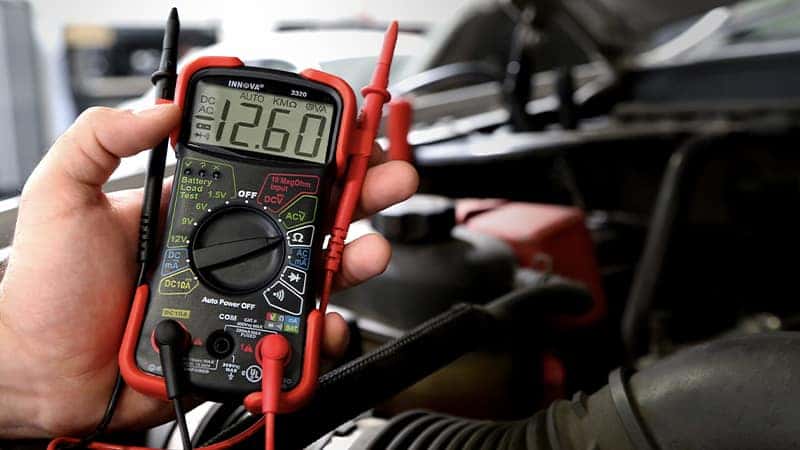Checking battery voltage with a multimeter
