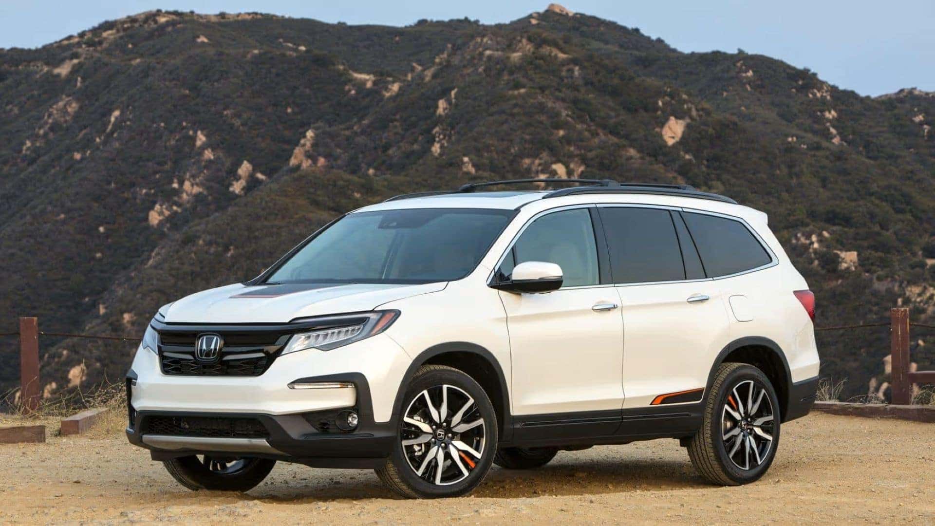 The 10th Place Winner, The 2020 Honda Pilot, Parked Center In Front Of Rocky Black Mountain