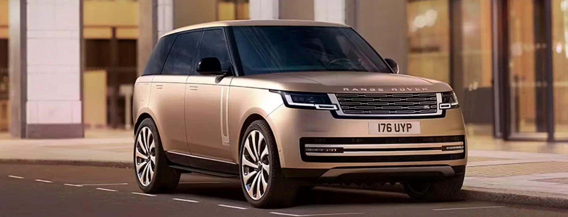 A Ravishing Rose Gold Range Rover, Parked Near A Luxurious Building