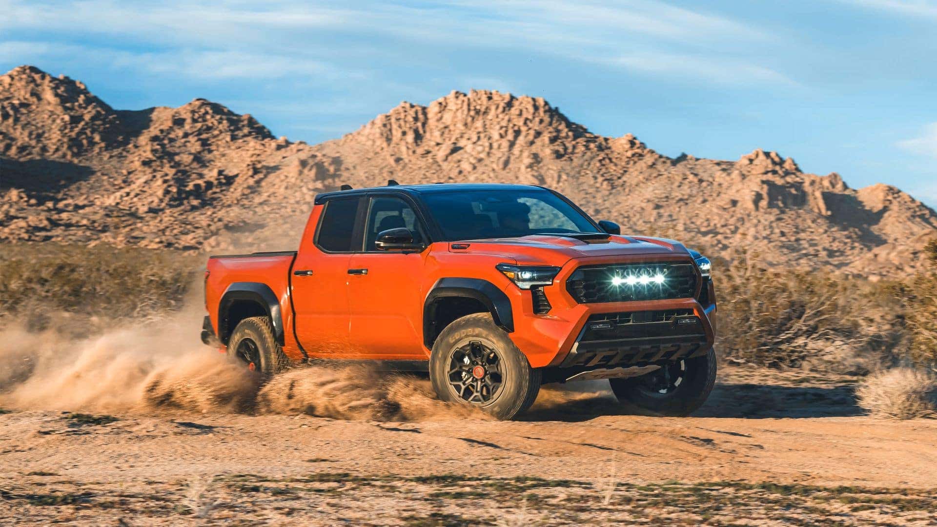 The Terrific And Accomplished Tacoma TRD Pro, Driving Through The Rocky Desert And Blowing Dust