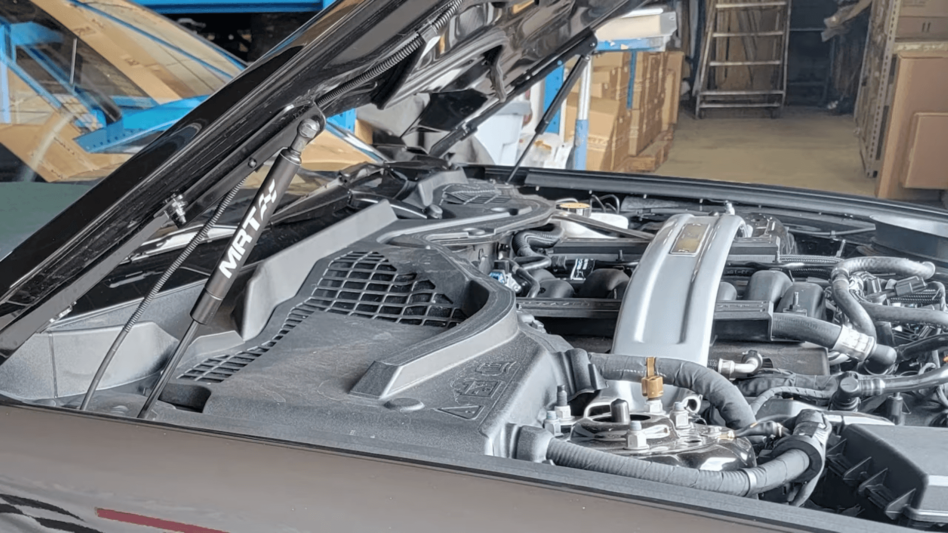 The Numerous Car Components Under The Vehicle's Hood