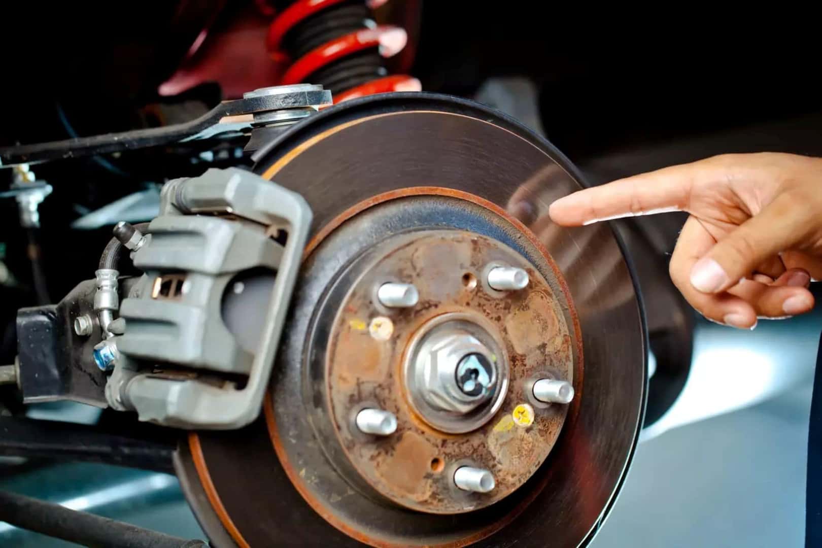The Complex Brake Rotor Being Inspected By A Hand