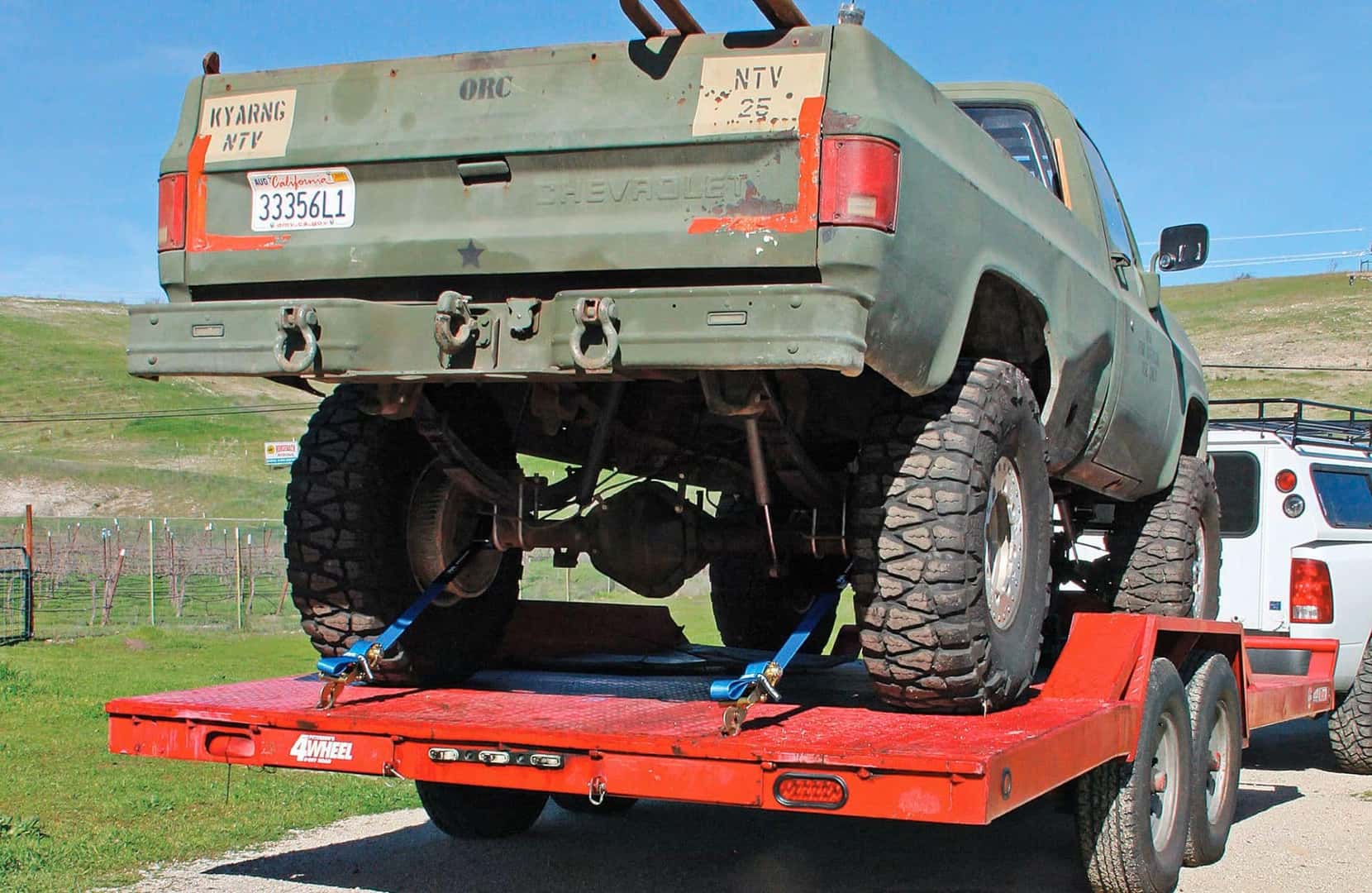 1986 Chevrolet 1008 CUCV strapped onto a trailer