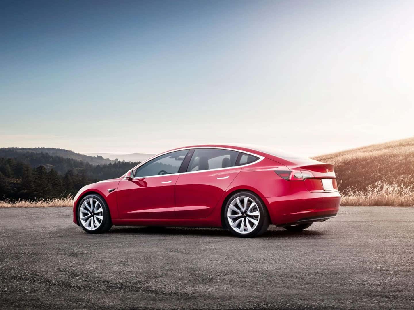 Tesla Model 3 red side profile