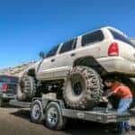 Dodge Durango being transported on a car trailer