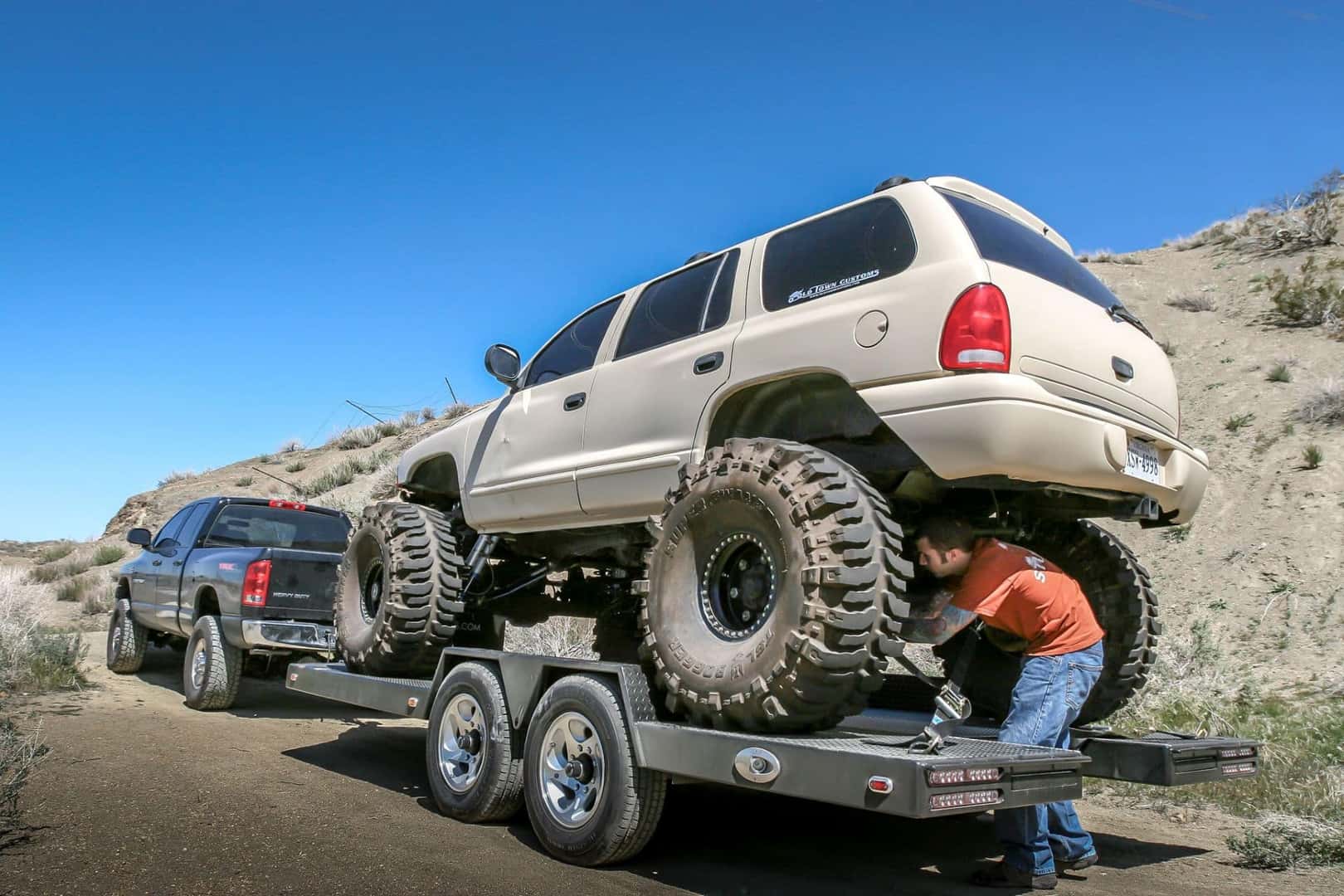 Dodge Durango being transported on a car trailer