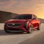 Red Cadillac CT-5 parked on a road