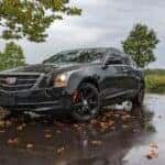 A Black Cadillac Car Parked on the Street