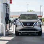 Nissan Rogue parked at a gas station