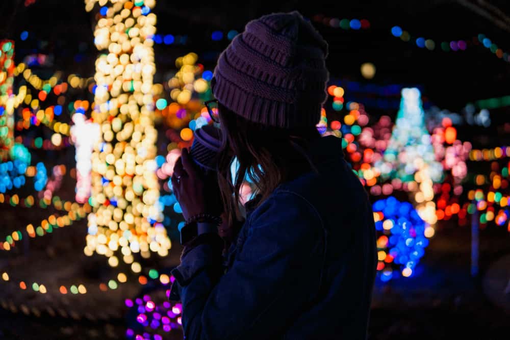 bokeh photography of women near lights