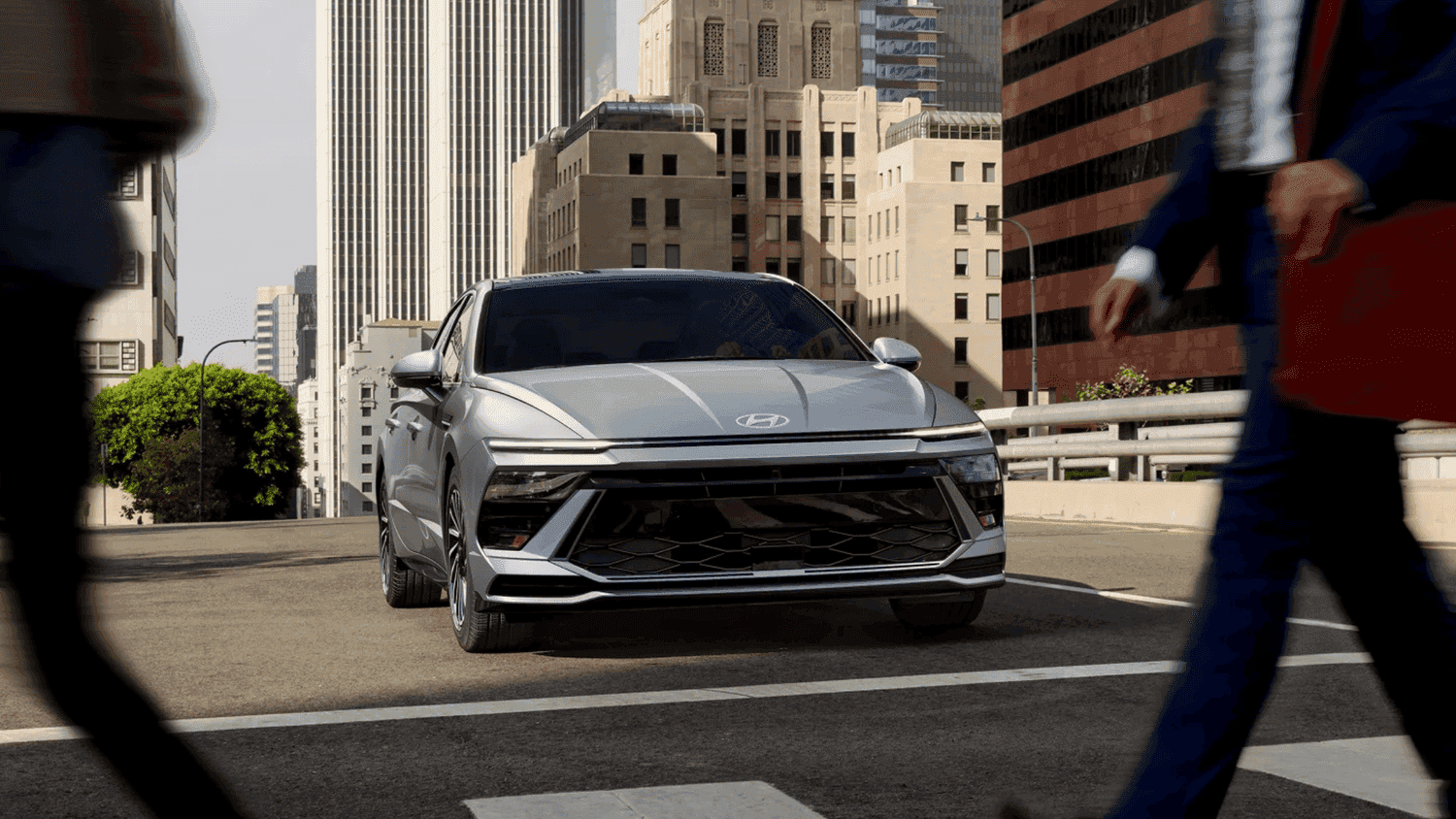 Front view of a 2025 Hyundai Sonata parked in the city, perfect for Athens, GA drivers focusing on maintenance like oil changes, brakes, and tires.