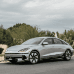 Sleek silver 2025 Hyundai IONIQ 6 on an Athens, GA street, highlighting its smooth daily driving and efficiency for local commutes.