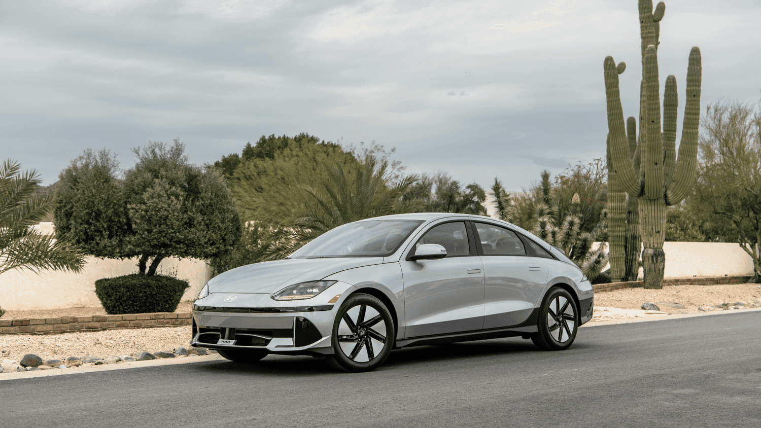 Sleek silver 2025 Hyundai IONIQ 6 on an Athens, GA street, highlighting its smooth daily driving and efficiency for local commutes.