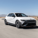 Dynamic 2025 Hyundai IONIQ 5 N drifting on open roads near Athens, GA, showing off the excitement of N Drift Mode.