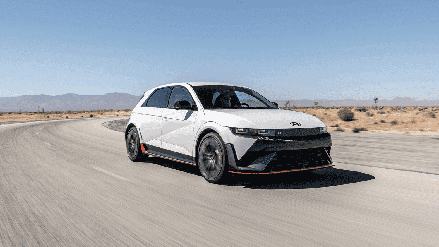 Dynamic 2025 Hyundai IONIQ 5 N drifting on open roads near Athens, GA, showing off the excitement of N Drift Mode.