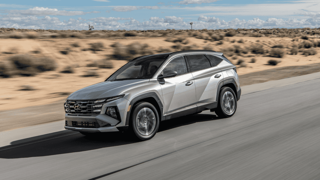 2025 Hyundai Tucson Plug-in Hybrid SUV driving in the desert, combining SUV versatility with hybrid efficiency.