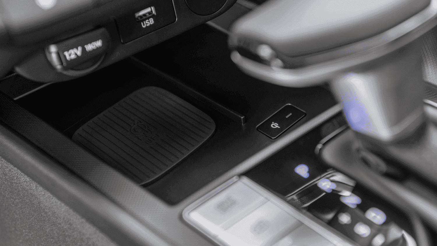 Close-up of the wireless charging pad in the 2025 Hyundai Elantra near Loganville, GA, showing modern tech features for convenience.