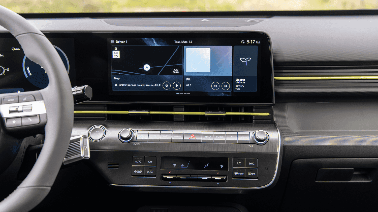 Center console touchscreen showing EV settings and audio options in the 2025 Hyundai Kona Electric in Athens, GA.