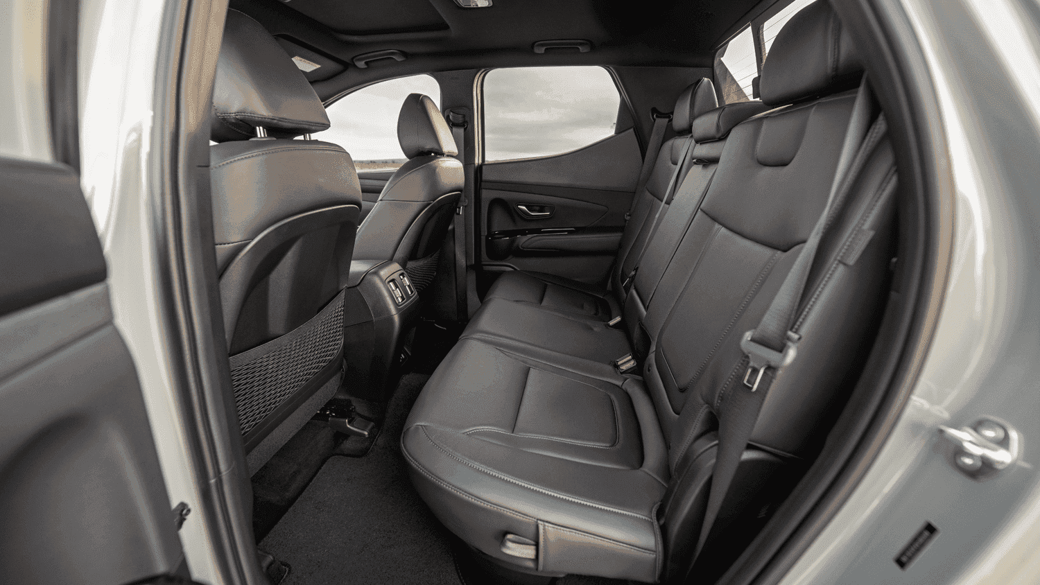 Spacious backseat of the 2025 Hyundai Santa Cruz, showcasing comfort and practicality for families in Athens, GA.