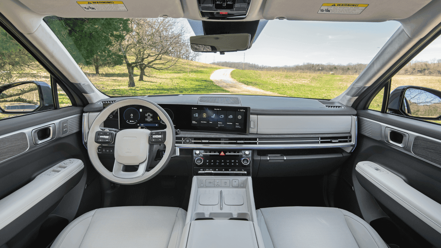 Close-up of premium white leather seats inside the 2025 Hyundai Santa Fe near Loganville, GA, showcasing comfort and upscale interior design.