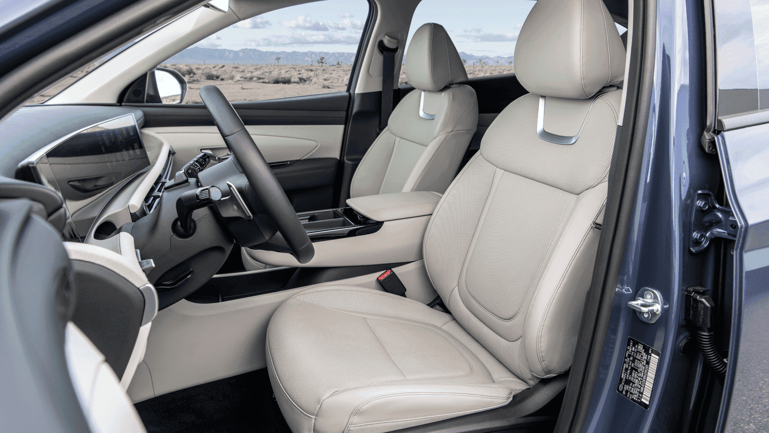 Modern beige leather front seats in the 2025 Hyundai Tucson, offering stylish comfort for Athens, GA buyers.