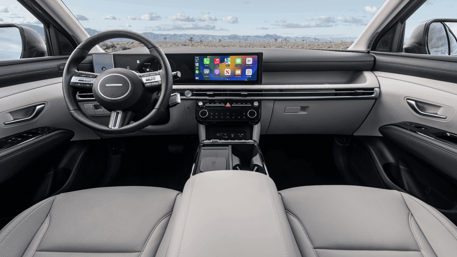 Modern dashboard and tech-focused interior of the 2025 Hyundai Tucson near Loganville, GA, featuring a sleek infotainment display.
