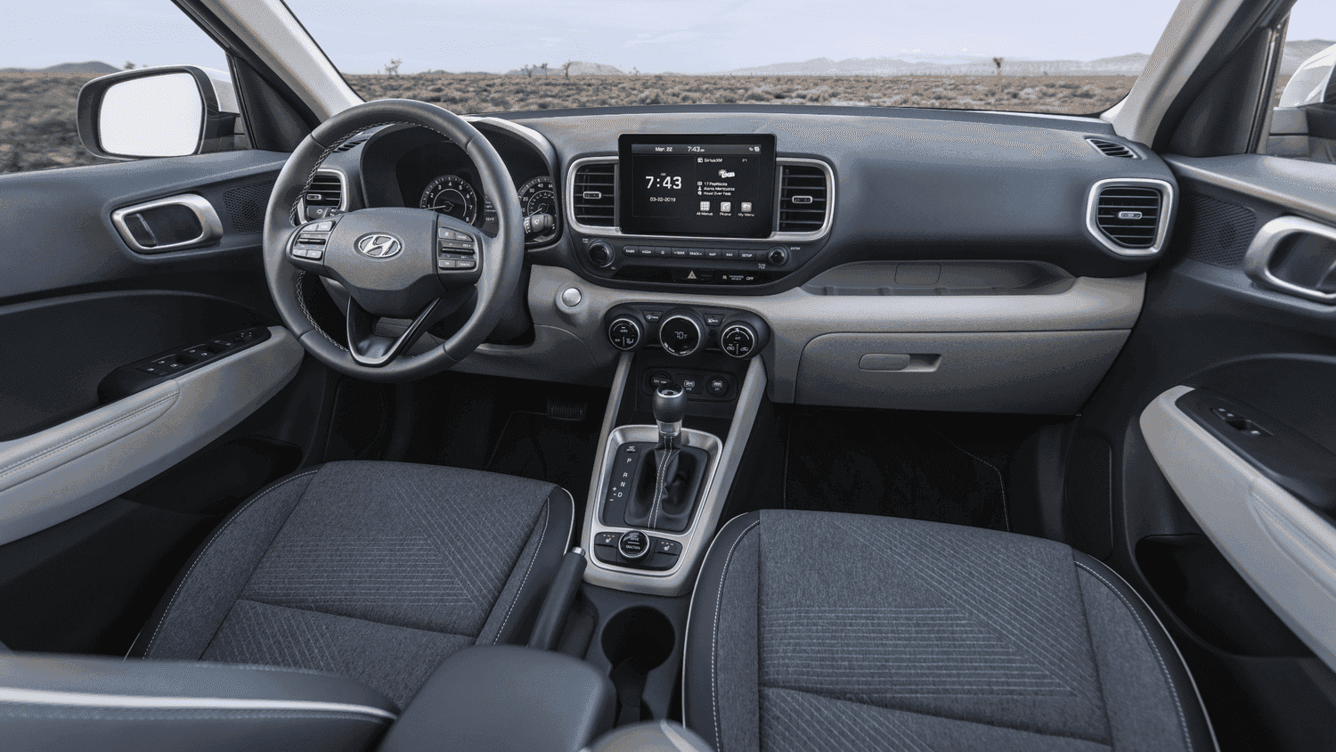 Modern dashboard and compact layout of the 2025 Hyundai Venue, shown near Athens, GA.