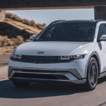 2025 Hyundai IONIQ 5 electric SUV cruising near Loganville, GA, featuring bold styling and zero-emission electric power.