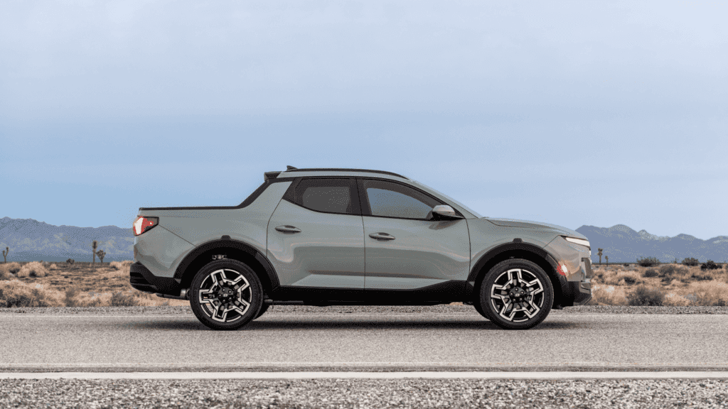 2025 Hyundai Santa Cruz pickup truck parked near Loganville, GA, showing off its versatile smart cargo system and unique design.