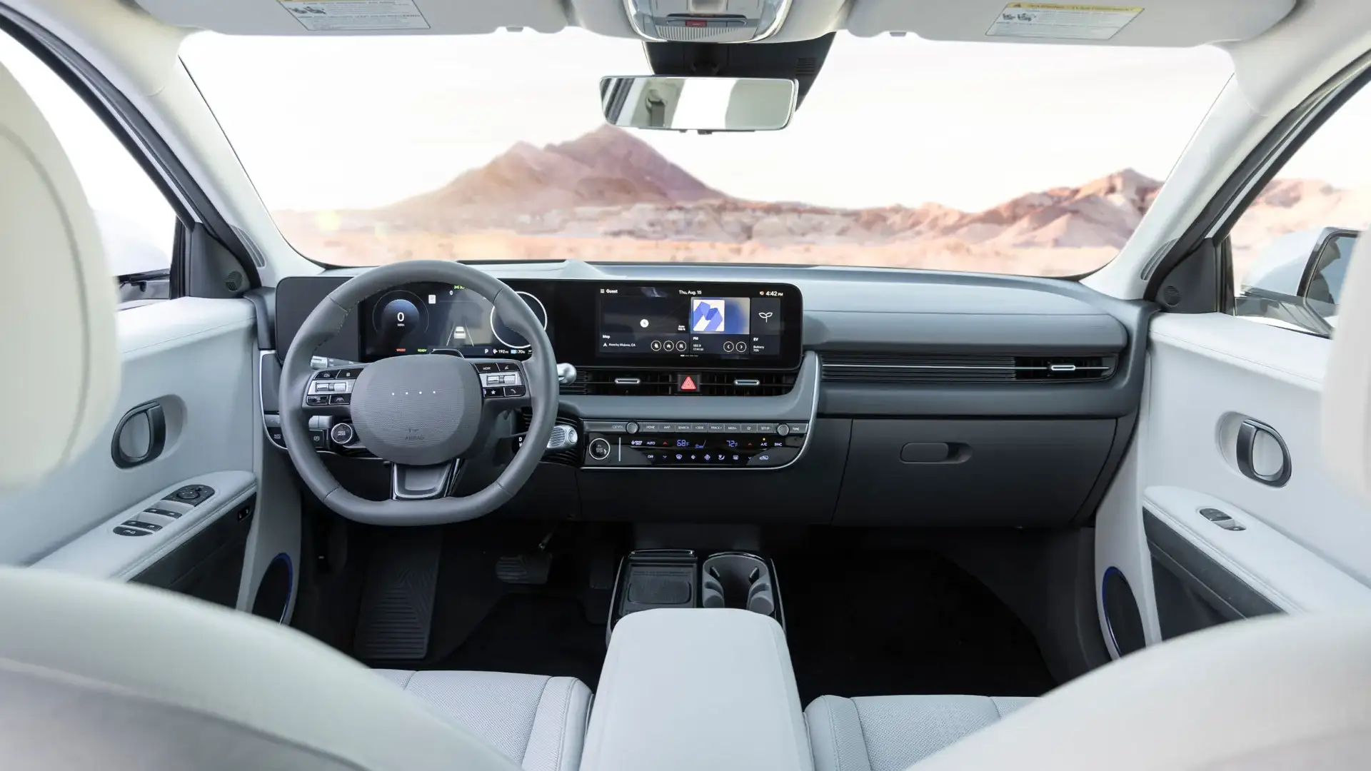 2026 Hyundai IONIQ 5 interior front view with digital cockpit, touchscreen display, and modern dash.