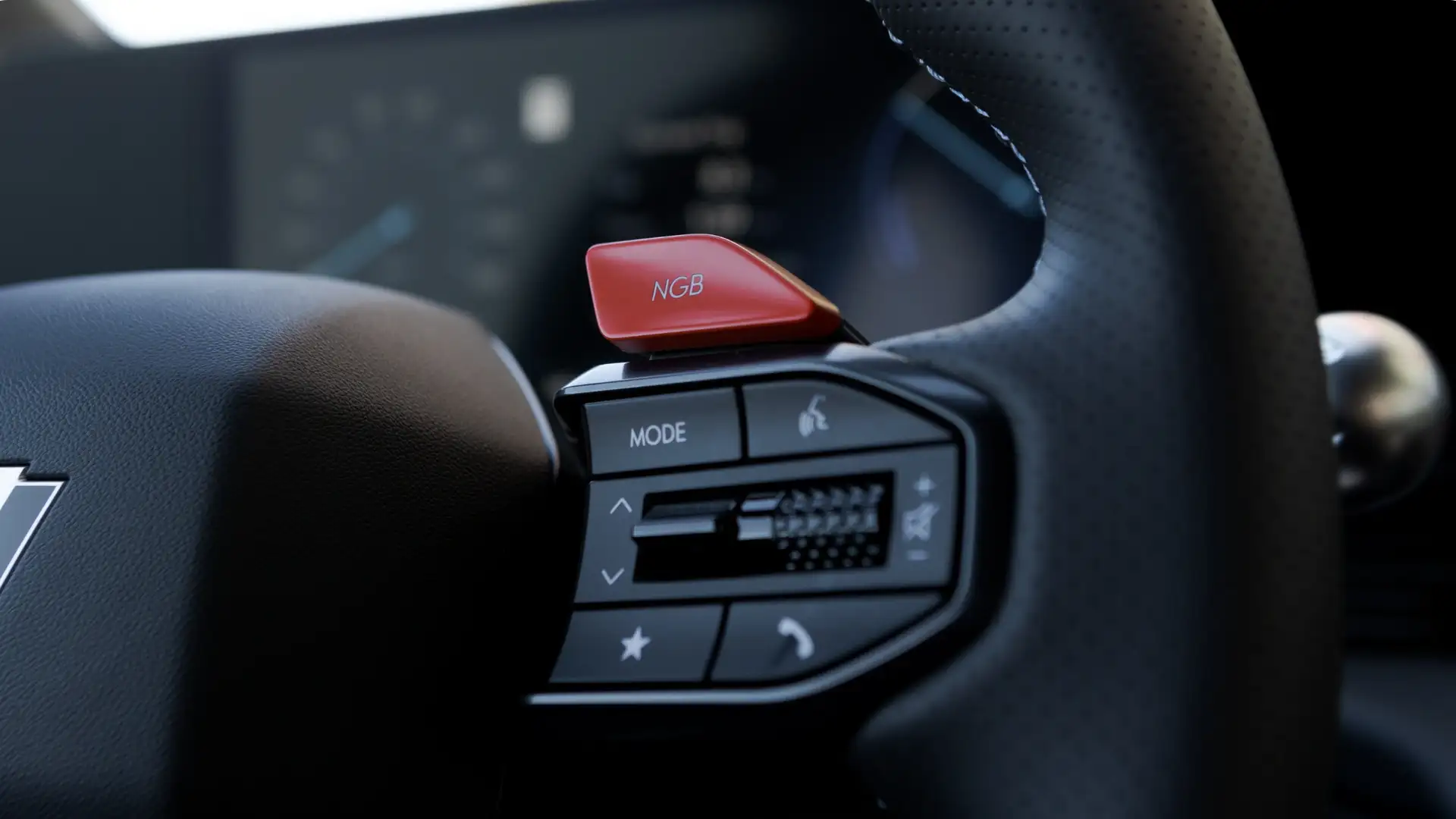 Close-up of the 2025 Hyundai IONIQ 5 N steering wheel highlighting the red NGB performance button and precision control switches.