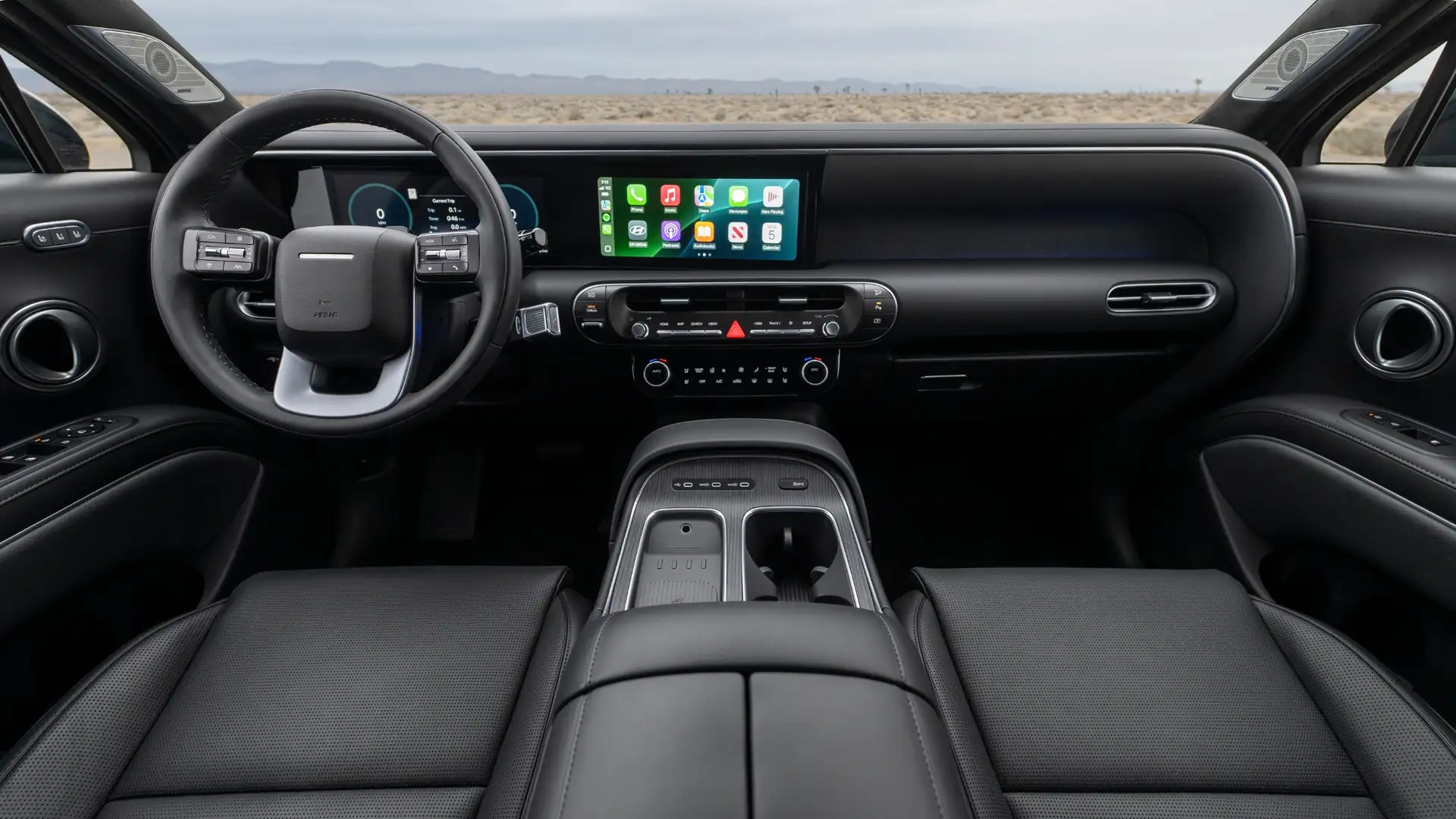 2026 Hyundai Palisade interior with dual-screen display and premium black leather seating surfaces.